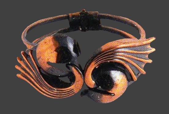 1960s copper bracelet with ball and curving wing design