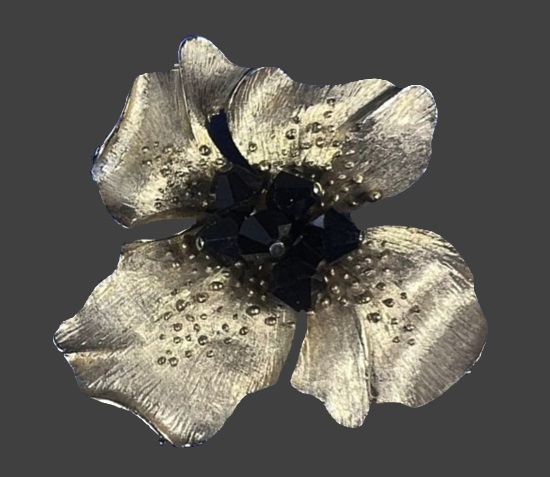 Black crystal center gold tone flower brooch