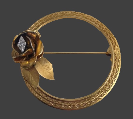 Circle pin with rose flower. 12 K gold filled, clear crystal