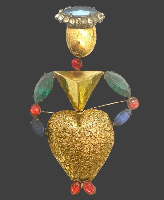 Lady in hat figural brooch of gold tone, rhinestones