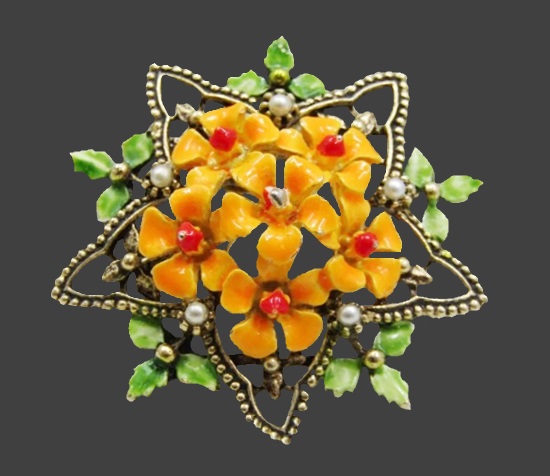Orange accent forget-me-not flowers inside a star brooch. Gold tone, green and orange enamel, art glass, cultured pearls