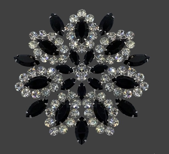 Black accent floral design crystal and rhinestone brooch pin of silver tone. B.David Jewellery Company History