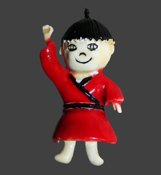 East wrestler enameled figural pin brooch