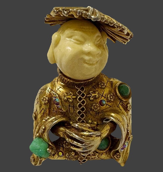 Smiling buddha gold tone rhinestone enamel brooch. Hargo Creations HAR Jewelry History