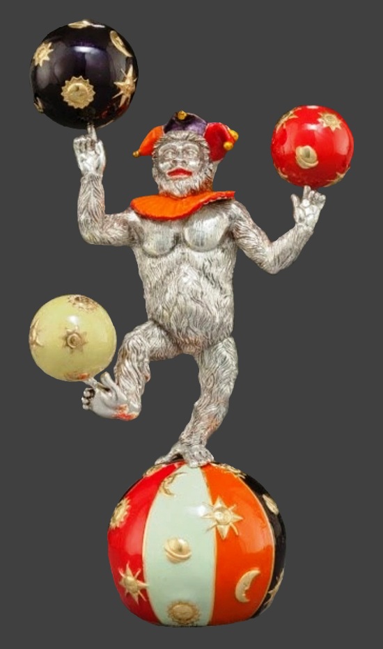 Balancing on a ball circus monkey