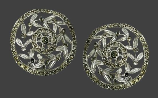 Round ornate silver tone rhinestone clip on earrings