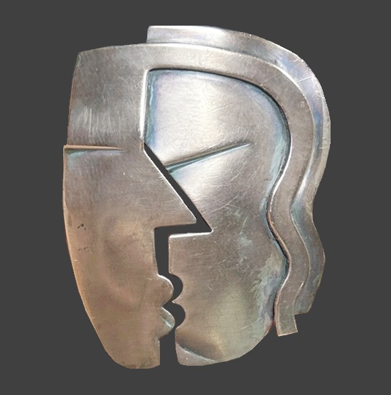 The Kiss modernist mid-century copper brooch pin