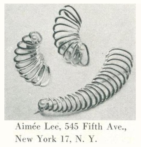 Spring of gold and prong set cultured pearl pin and earrings, Vogue December 1954
