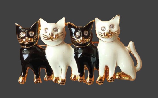 Black and white cats enameled brooch