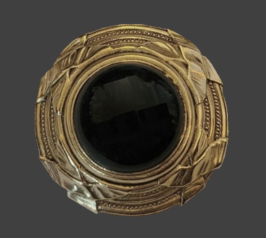 Black glass gold tone round brooch