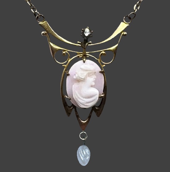 Cameo gold tone pendant with charm