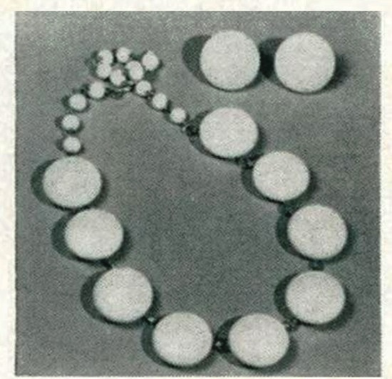 Chalk white necklace and earrings, Vogue April 1954
