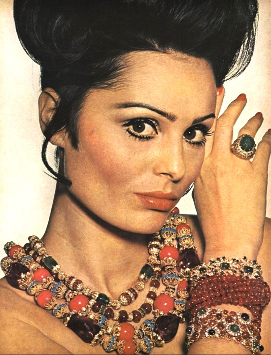 Daliah Lavi wearing Van Cleef & Arpels necklace and bracelets, Vogue October 1965 ad