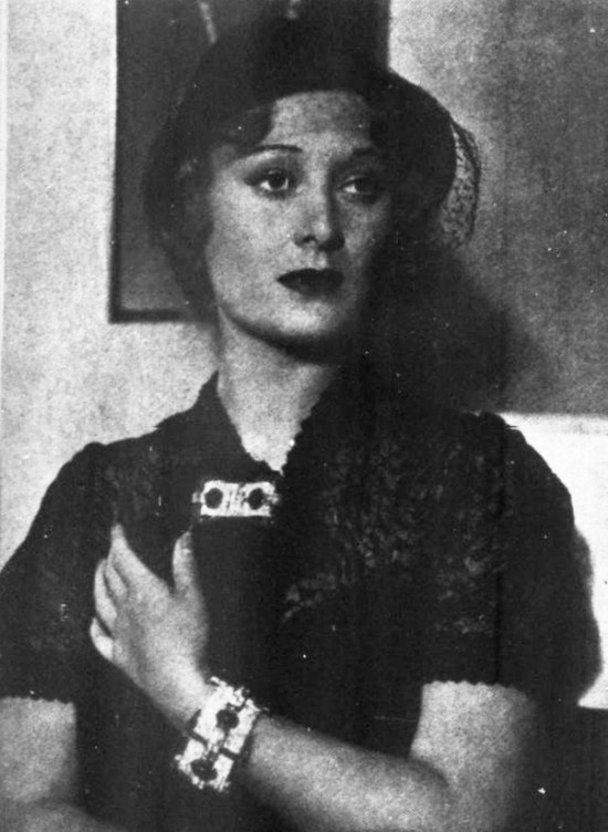 Dolores Costello Barrymore wears emeralds and diamonds, in jewelry designed by Trabert & Hoeffer, in Paramount’s ‘Yours for the Asking.’ 1936