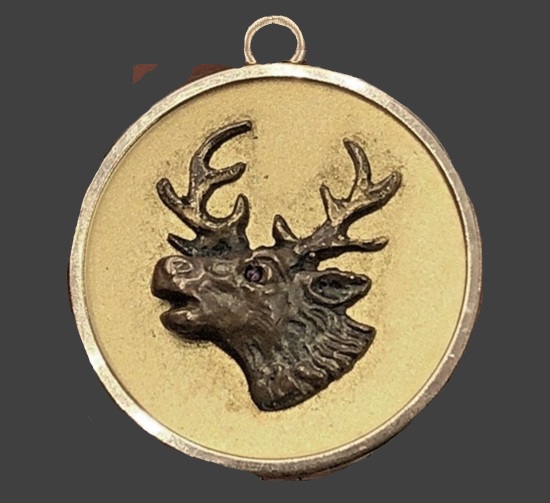 Elk gold filled garnet eyes locket, 1904