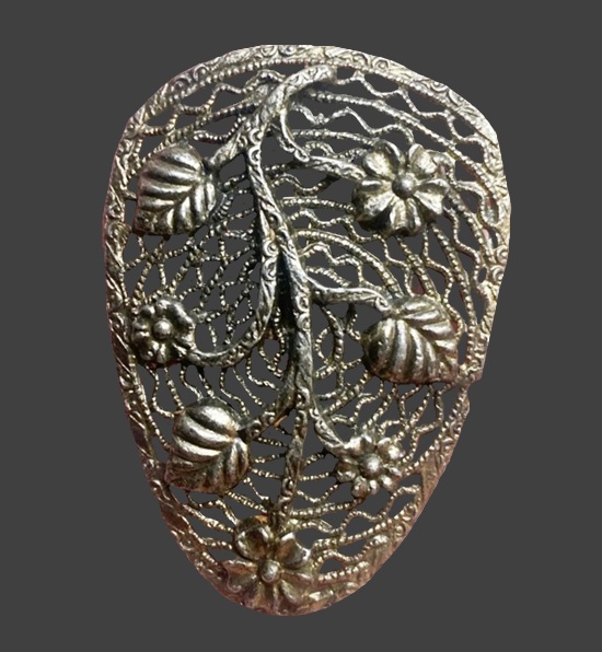 Filigree gold tone dress clip