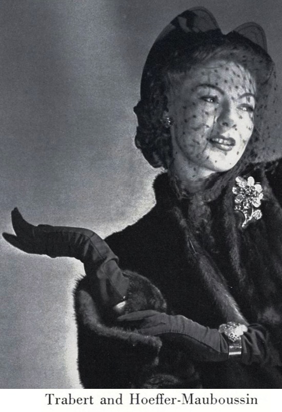 Fine jewelry by Trabert and Hoeffer-Mauboussin, Vogue August 1940 ad