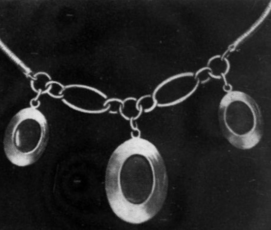 Genuine onyx or jade hematite necklace, 12K gold-filled, retails at $30. JCK June 1953