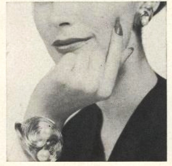 Gilt-wire bracelet with 'pearl' studs at both ends, $8.95; earrings wrapped and studded to match, $3.95, Vogue September 1956