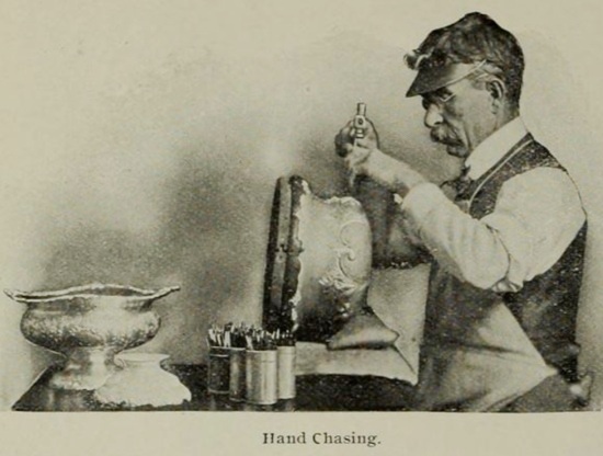 Hand chasing silversmith, 1905