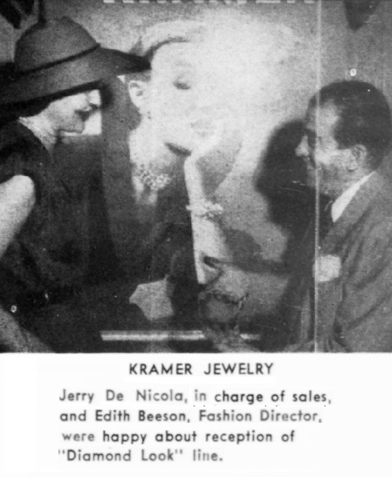 Jerry De Nicola, sales manager for Kramer Jewelry, and Edith Beeson, Fashion Director, were happy about reception of 'Diamond Look' line. Jeweler's Circular September 1951