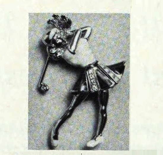 Lady golfer pin enameled 18 K gold, set with 8 diamonds, $420, May 1971