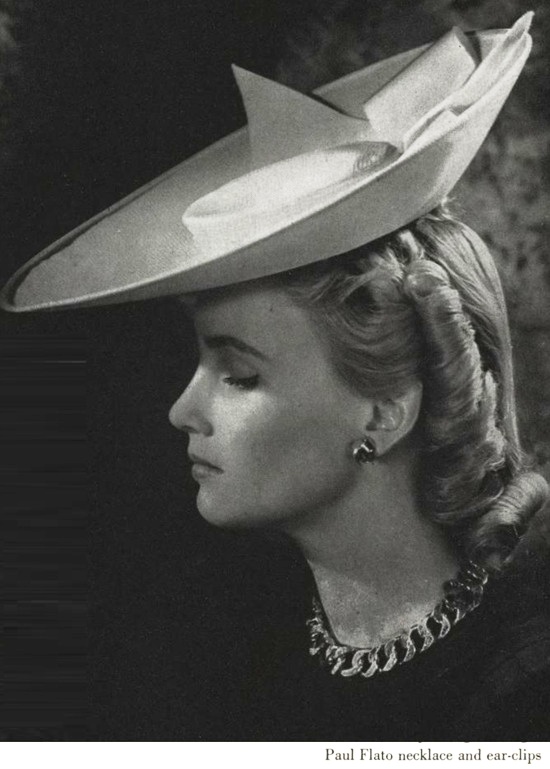 Necklace and ear-clips by Flato, Vogue May 1940 ad
