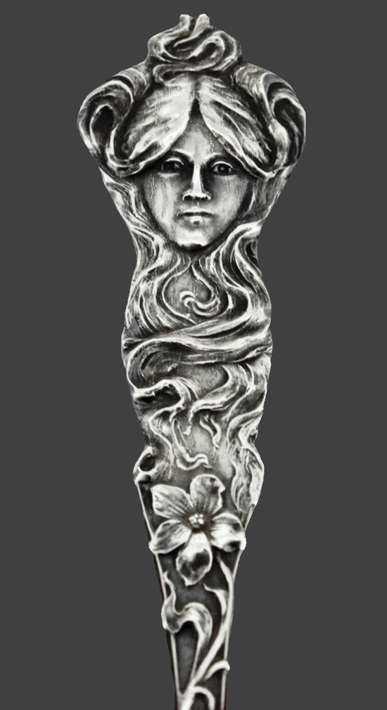 Nouveau design sterling silver spoon