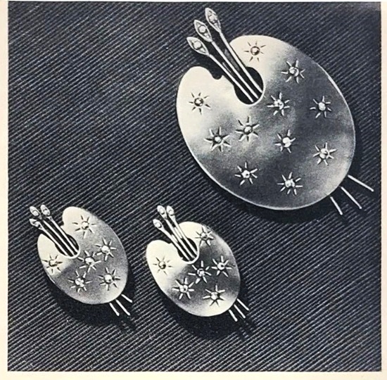 Palette pin and ear clips, gold plated sterling silver studded with clear rhinestones, 1944 ad
