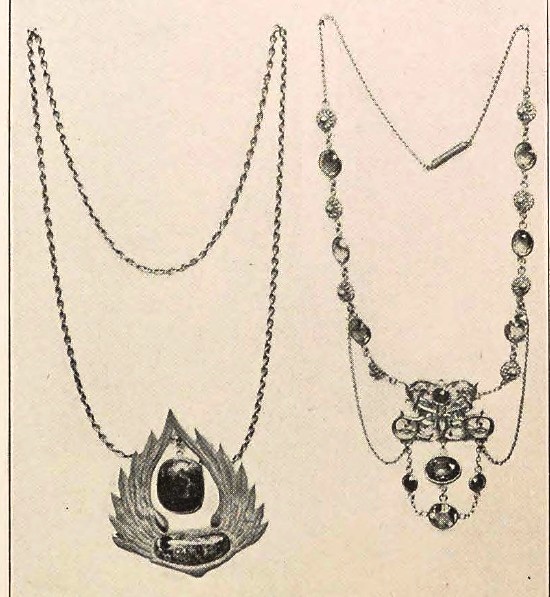 Pendant in green gold set with azurite. Necklace in Roman gold, set with Spanish and Brazilian topaz