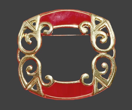 Red enamel gold tone brooch