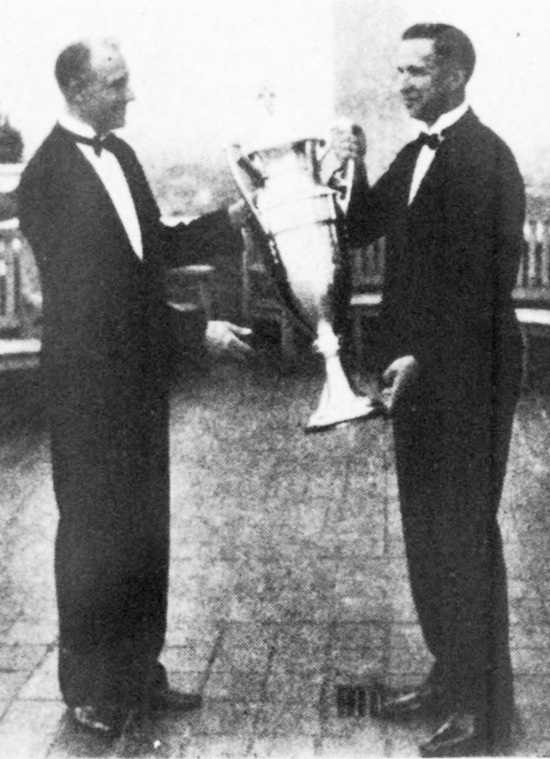 Stephen Rae Hickok, President of the Hickok Company, Presenting the Cup to Clement Kieffer. Display World, September 1928
