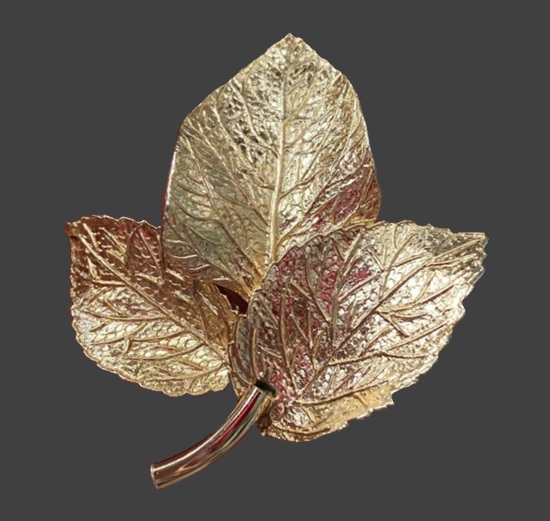 Textured gold tone leaf brooch