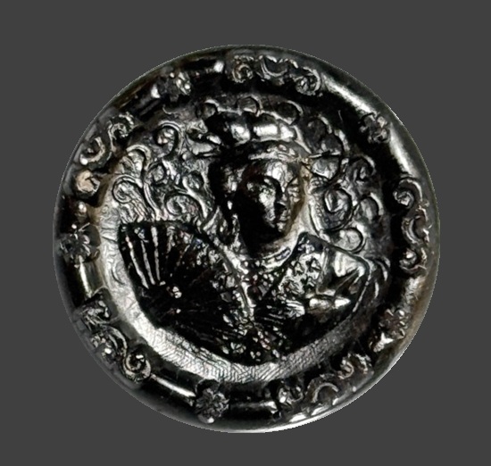 The Mikado Opera black glass button, 1880