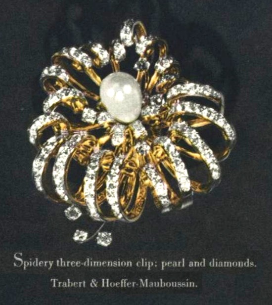 Trabert Hoeffer Spidery three-dimension clip, pearl and diamonds, Vogue November 1945 ad